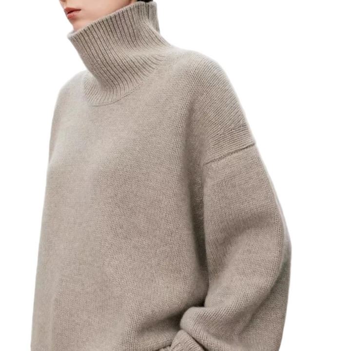 Elegant damtröja med turtleneck i klassisk stil. Perfekt för vardagsmode och vinterdagar.