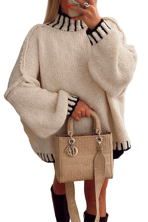 Elegant damtröja med turtleneck och trendigt färgblock. Perfekt för höst- och vintermode, bekväm pullover.
