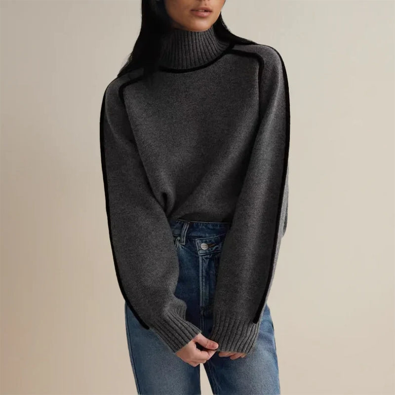 Elegant stickad damtröja med varm rullkrage. Perfekt för mode och komfort under vintern.