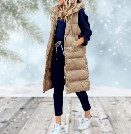 Lång damväst utan ärmar, en tidlös mantel. Elegant ytterplagg för en stilren look vår & höst.