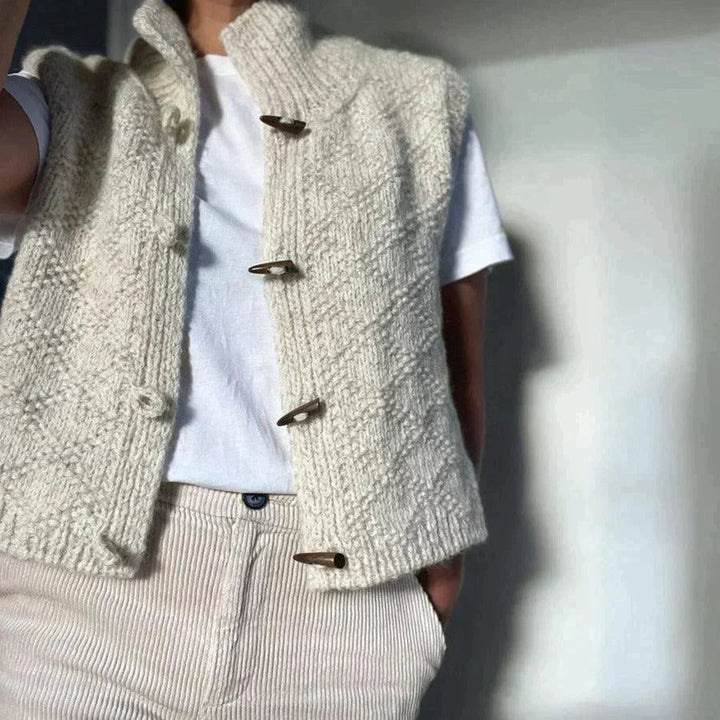 Trendig, ärmlös och kort damväst i modern design, idealisk för stilfulla lager på lager outfits.