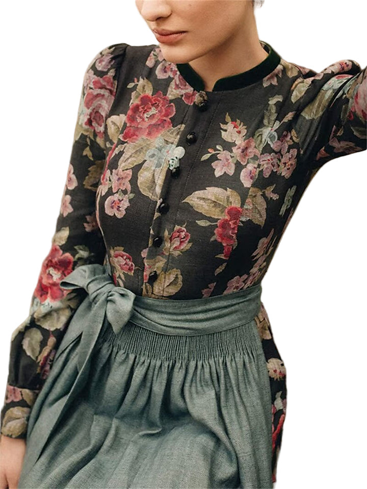 Elegant dirndlklänning för kvinnor med traditionell design och vackert blommönster, perfekt för fest.