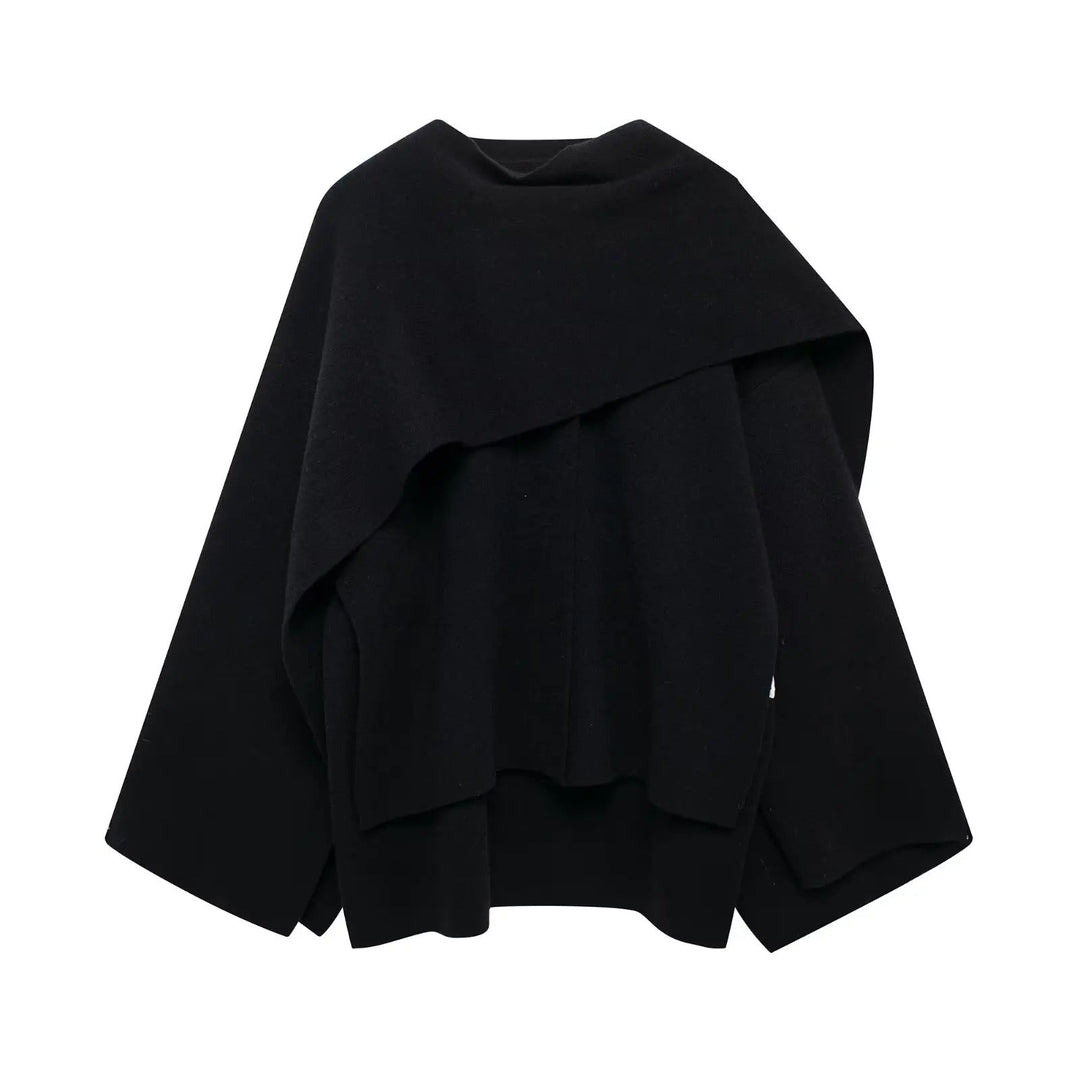 Modern modekappa för kvinnor, en stilren draperad cape med unik design.