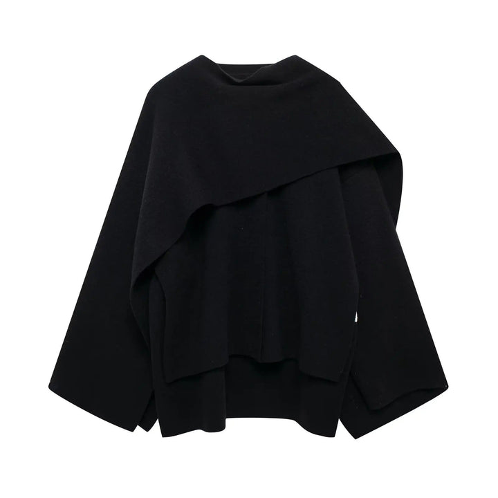 Modern modekappa för kvinnor, en stilren draperad cape med unik design.
