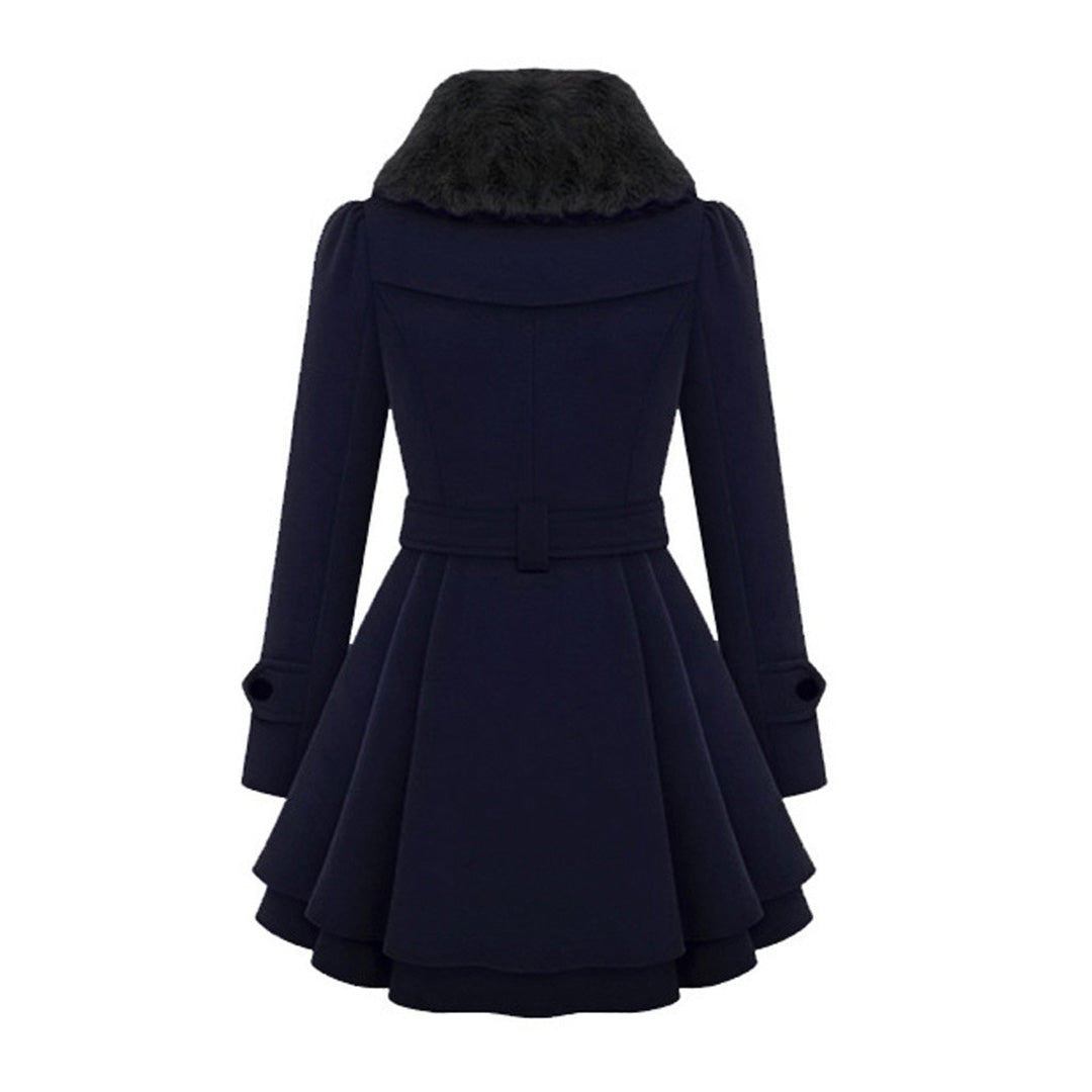 Festlig och varm damvinterkappa, lång modell med elegant snitt. Perfekt figursydd ytterplagg för kalla dagar.