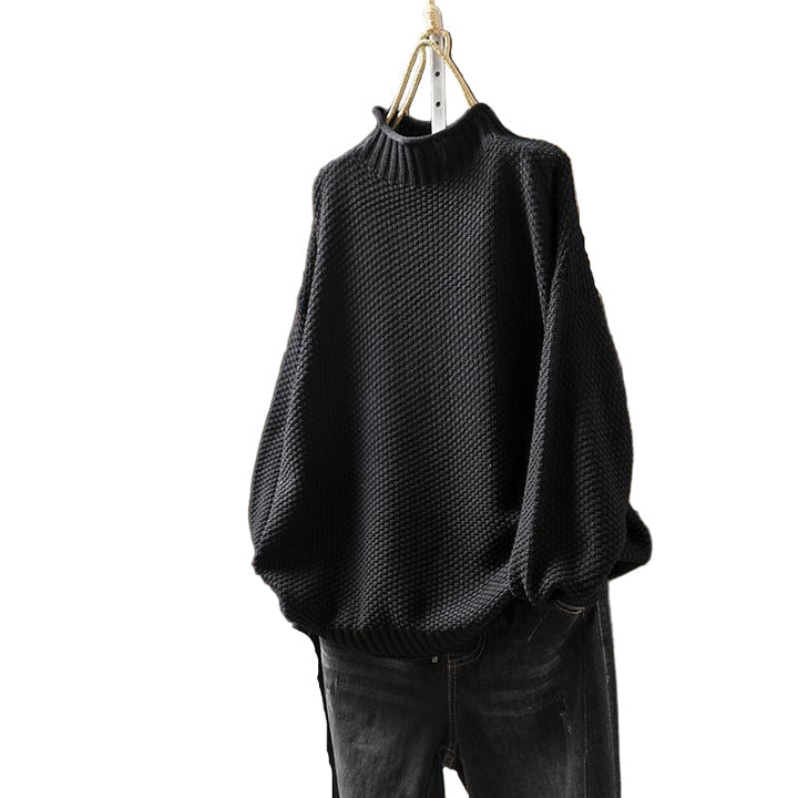 Elegant finstickad damtröja med polokrage. Perfekt för kvinnors vardagsstil och höstmode.