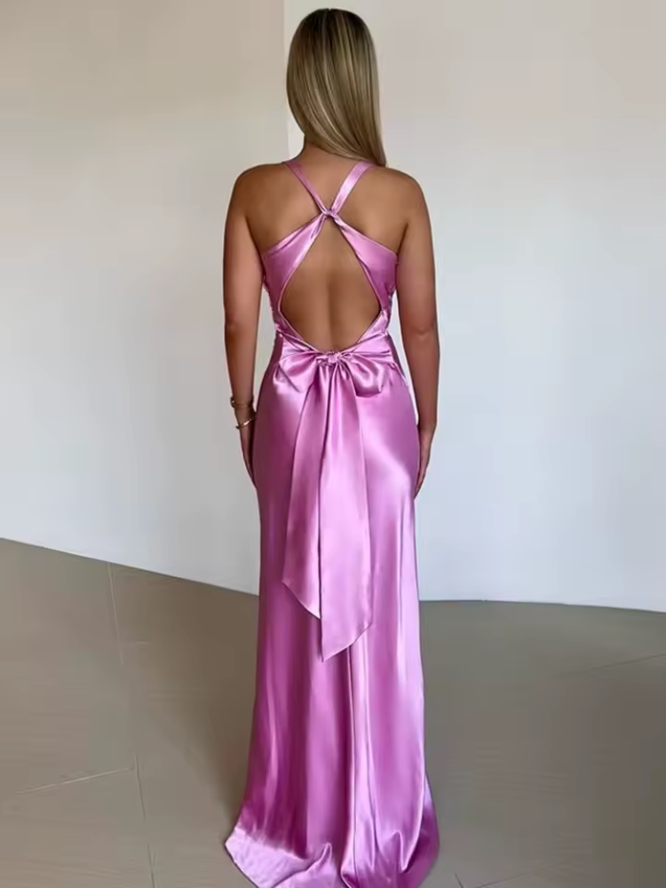 Mångsidig kvinnors maxiklänning, ärmlös med flödande elegant stil. Perfekt för semester och fester.