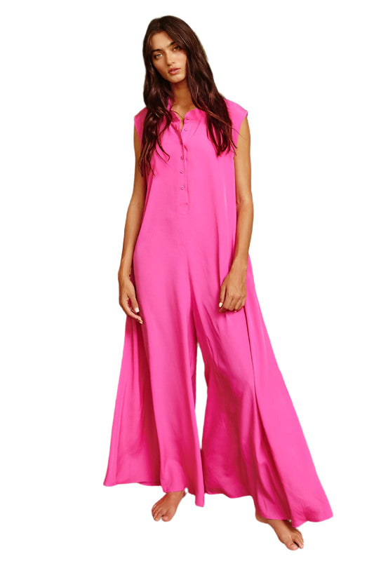 Elegant fuchsia dam jumpsuit med vida ben. Stilren byxdress perfekt för fest, vardag och sommar.
