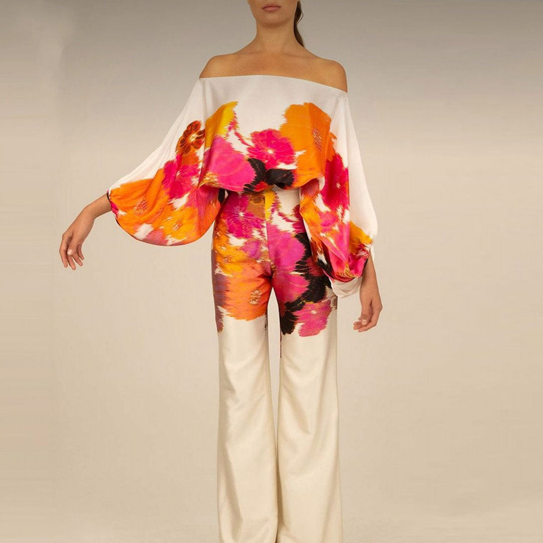 Rosa tvådelat elegant sommarset med off-shoulder topp. Festkläder för dam som är både bekvämt och stilfullt.