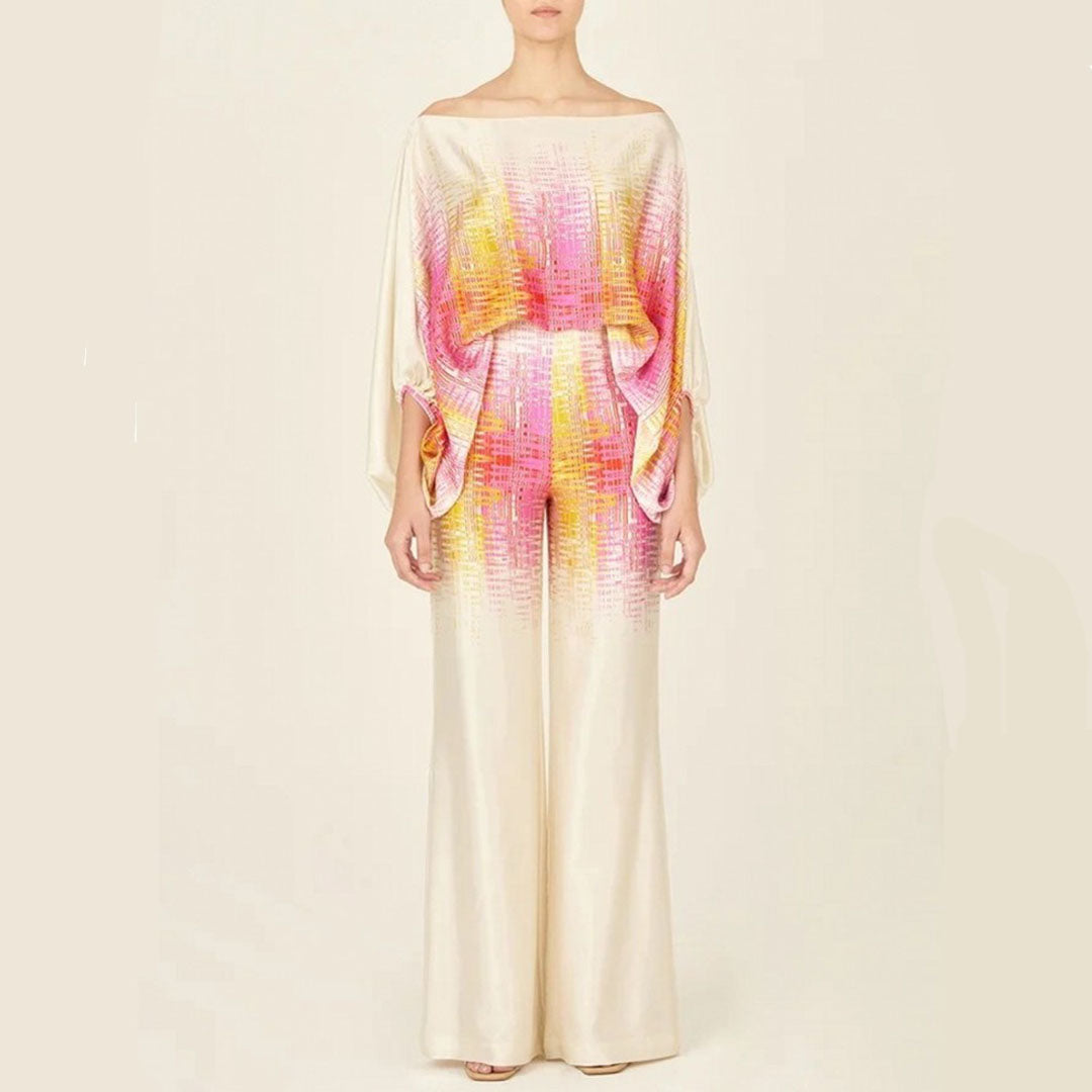 Chic tvådelat damset med off-shoulder ärmar, perfekt sommaroutfit. Elegant och avslappnad för varma dagar.