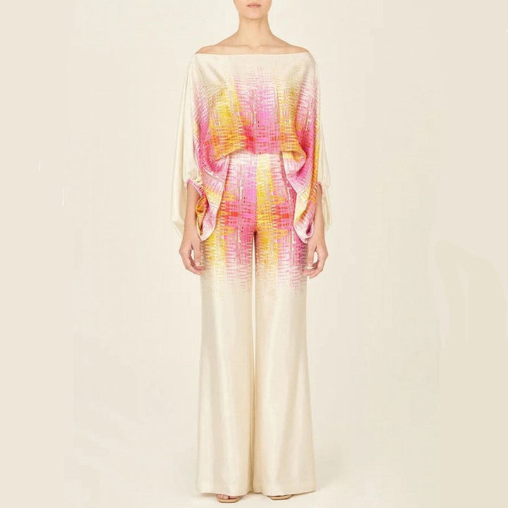 Chic tvådelat damset med off-shoulder ärmar, perfekt sommaroutfit. Elegant och avslappnad för varma dagar.