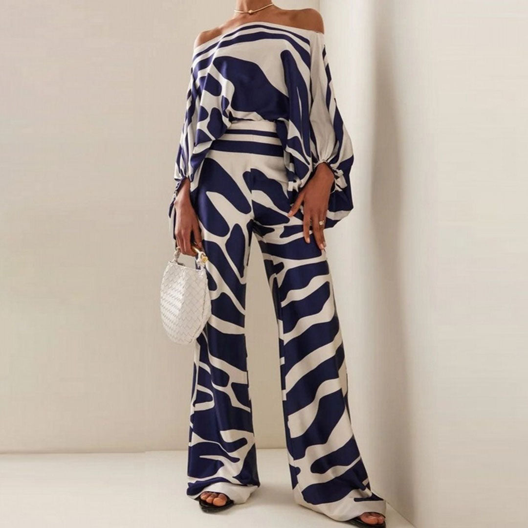 Modernt tvådelat sommarset med off-shoulder. Elegant damkläder som är både bekvämt och stilrent för sommaren.