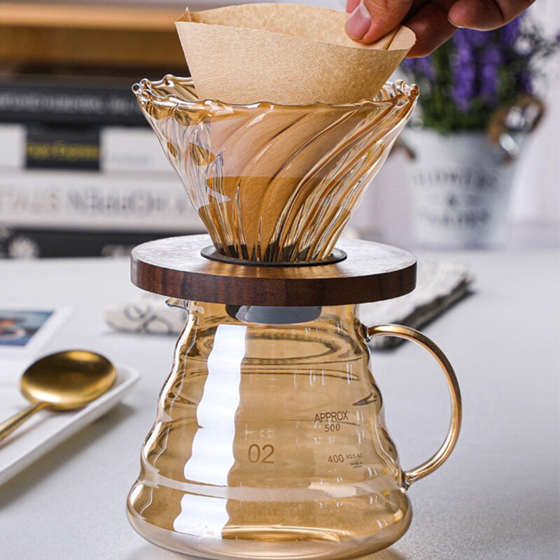 Komplett kaffebryggare set i borosilikatglas med kaffefilter och serveringskanna, barista-kvalitet.