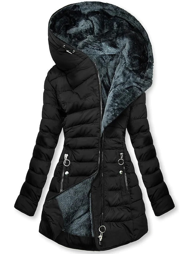 Ljusgrön lång vinterjacka för dam, elegant och varm. Stilren ytterplagg, perfekt som vardags- eller festjacka i vinter.