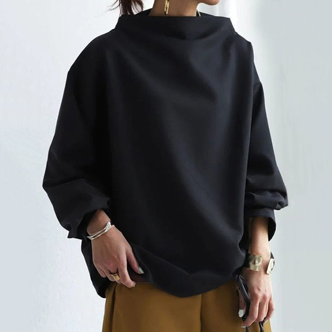 Kvinnors chic höghalsad topp i svart, långärmad och perfekt för mode.