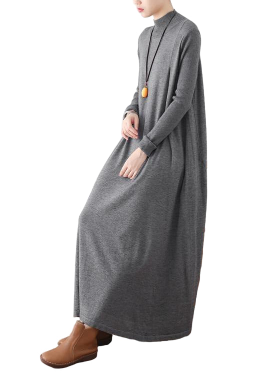 Elegant höghalsad tunikaklänning med batwingärmar för kvinnor. Modern vardagsstil i bekvämt snitt.
