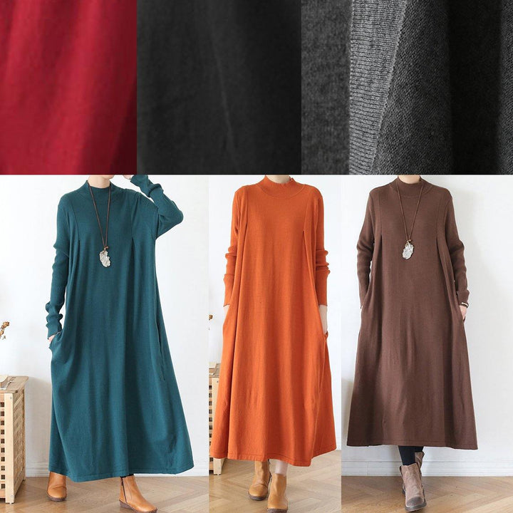 Röd höghalsad tunikaklänning med batwingärmar, bekväm vardagsklänning för kvinnor i modern stil.