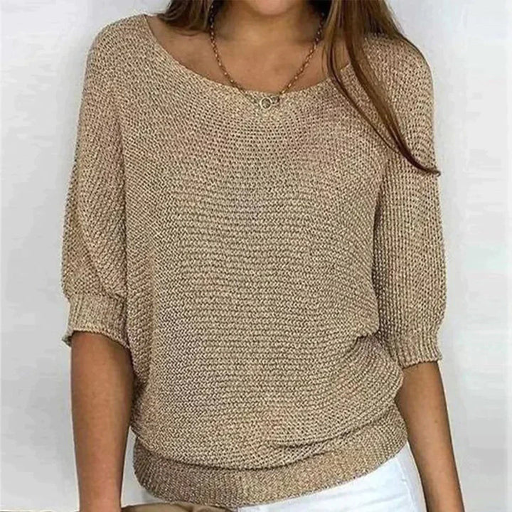 Avslappnad men elegant kvinnors topp, långärmad och lös, för höstens alla tillfällen.