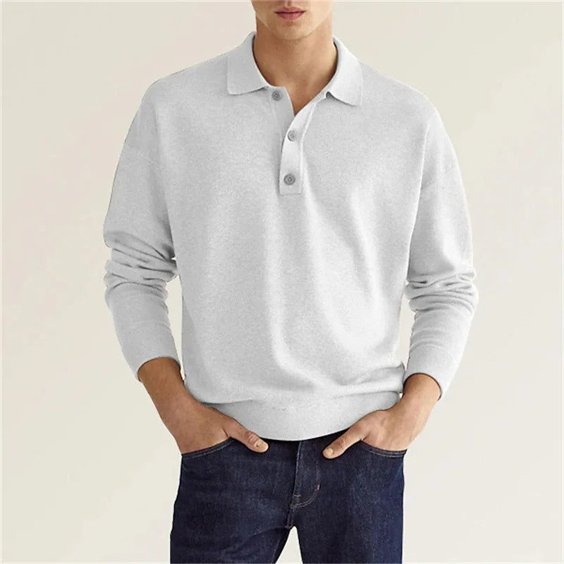 Långärmad piké för herrar, ett mångsidigt basplagg för både avslappnad och elegant vardagslook.