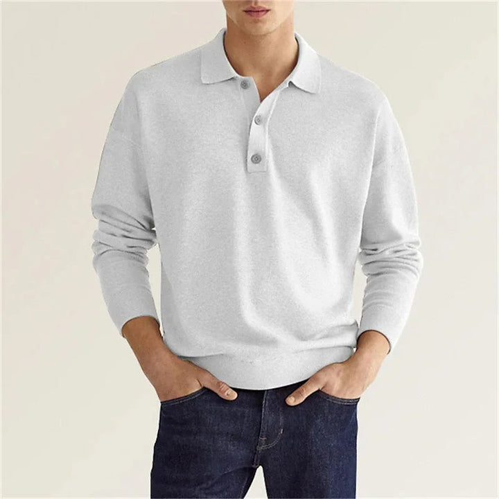 Långärmad piké för herrar, ett mångsidigt basplagg för både avslappnad och elegant vardagslook.