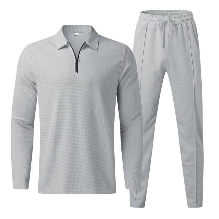 Komplett herr set med matchande jacka och byxor. Modernt och elegant för en stilren look, idealiskt för mode män.