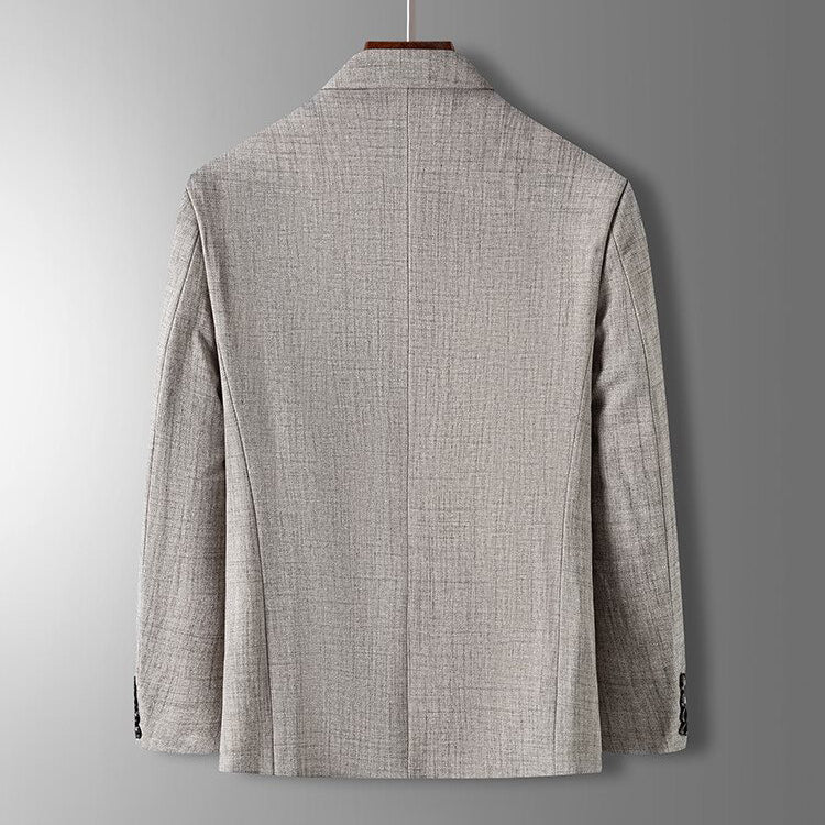 Tidlös herrblazer för business, med rak skärning och kostymkrage. Ger en professionell och elegant stil.