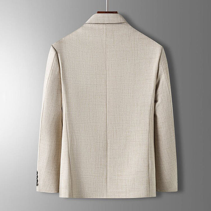 Klassisk blazer för män med rak passform och stilren kostymkrage. Essentiell del av det moderna herrmodet.