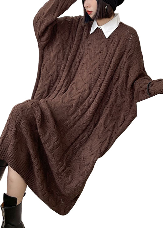 Elegant jacquardmönstrad damklänning med O-hals. Stickad höst/vinterklänning i bekväm design för vardag.