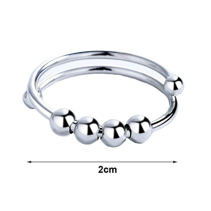 Gruppfotografi av den ångestlindrande fidgetringen med justerbar design, en nyckelaccessoar för kvinnor.