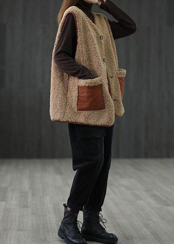 Elegant khaki dam blusväst, perfekt för höstmode. Med snygga fickor för både stil och funktion.