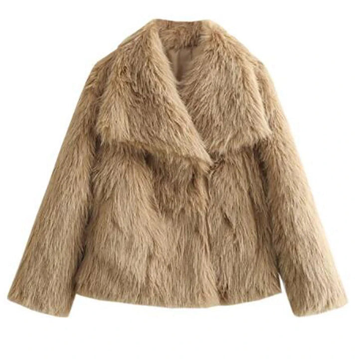 Stilren kort vinterjacka för dam. Fluffig och varm, ett elegant modeplagg.