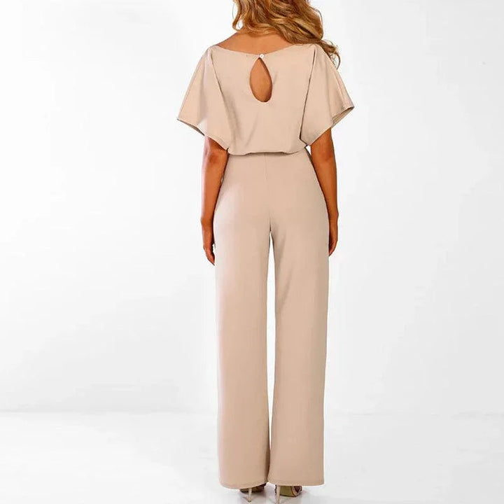 Chic kvinnors fest jumpsuit i klassisk design med bälte, perfekt för kvällens evenemang.