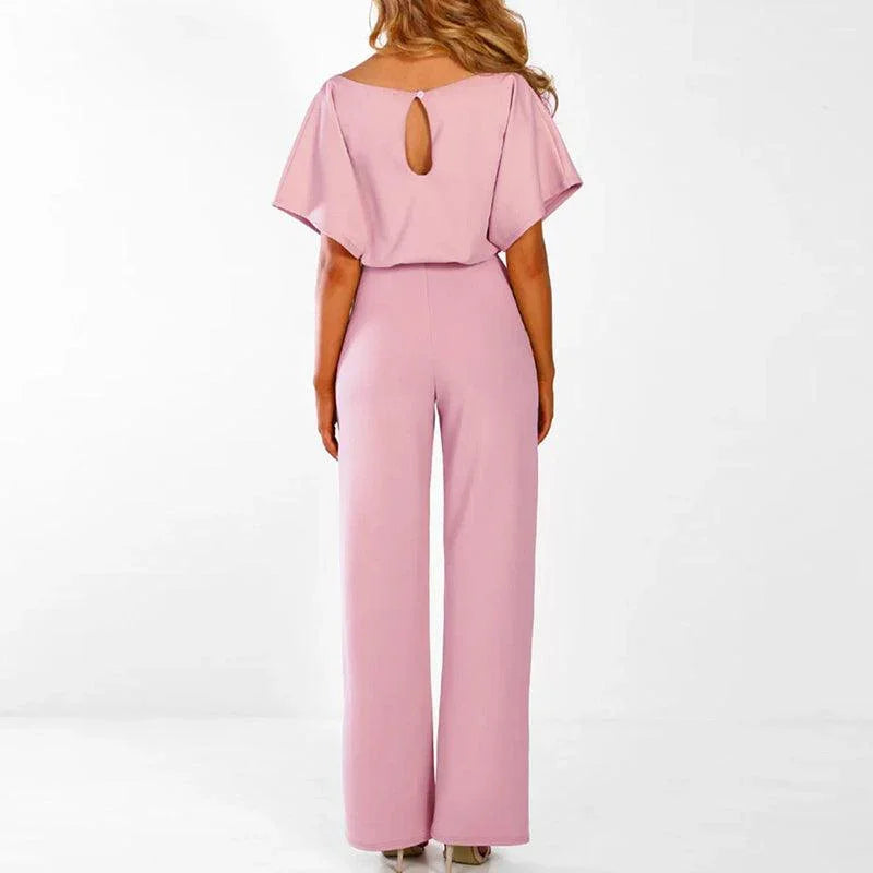 Mode-riktig kvinnors jumpsuit med bälte, perfekt för en elegant och bekväm stil hela dagen.
