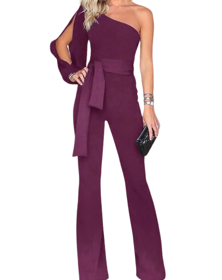 Elegant kvinnors jumpsuit med rosettbälte för festliga tillfällen.