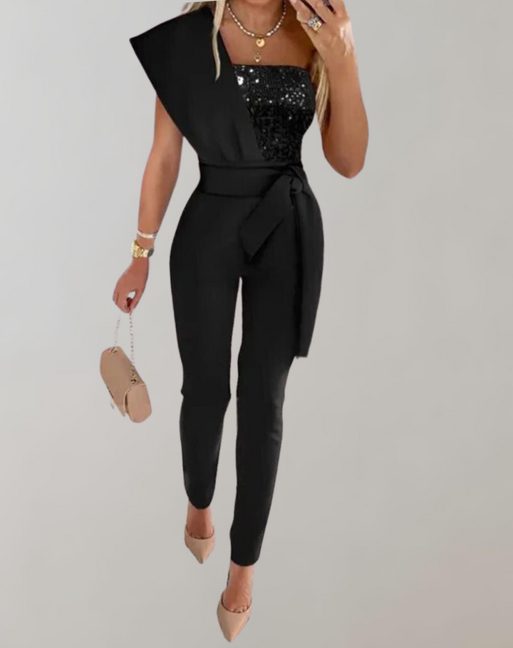 Damjumpsuit med elegant passform och chic rosett, idealisk för speciella event.