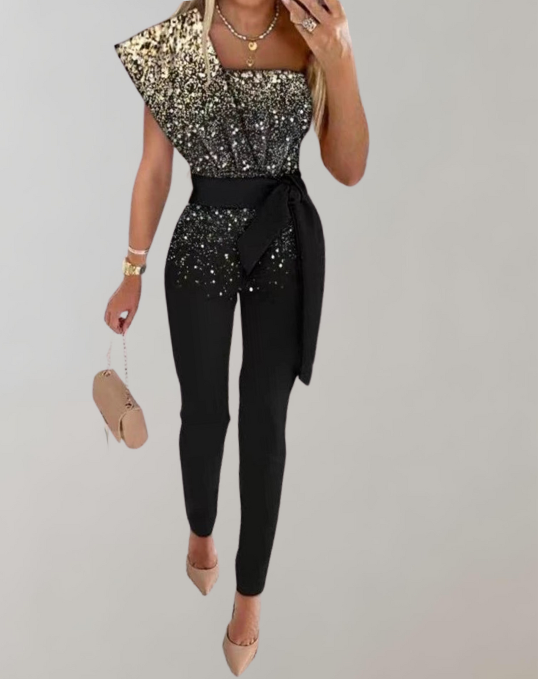 Stilren festjumpsuit för dam med elegant rosettbälte, perfekt för gala.