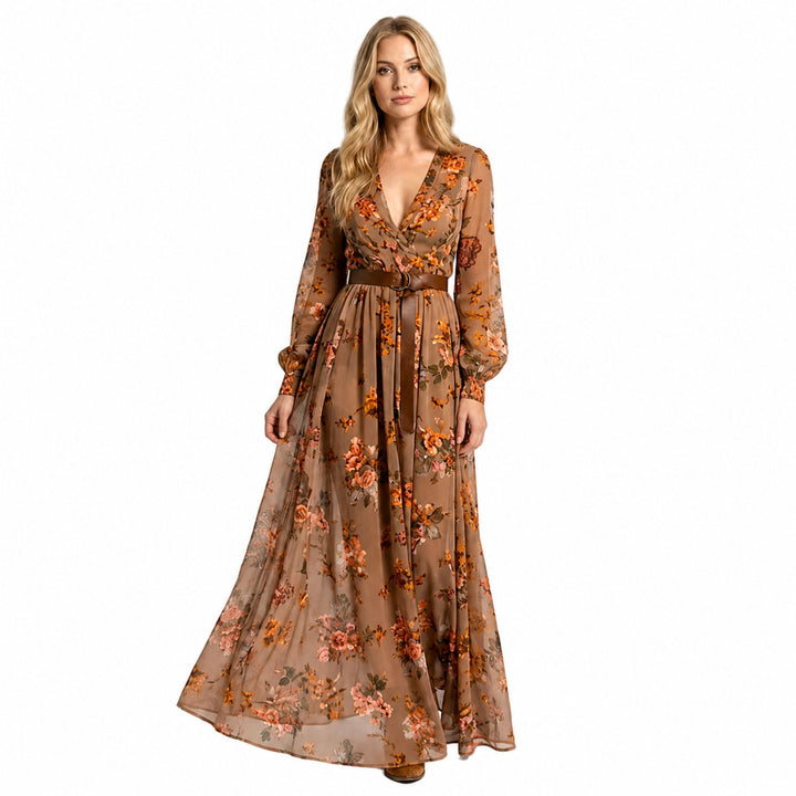 Elegant kvinnors maxiklänning med v-ringning i luftig boho-stil, perfekt för sommarfester. Långa ärmar.