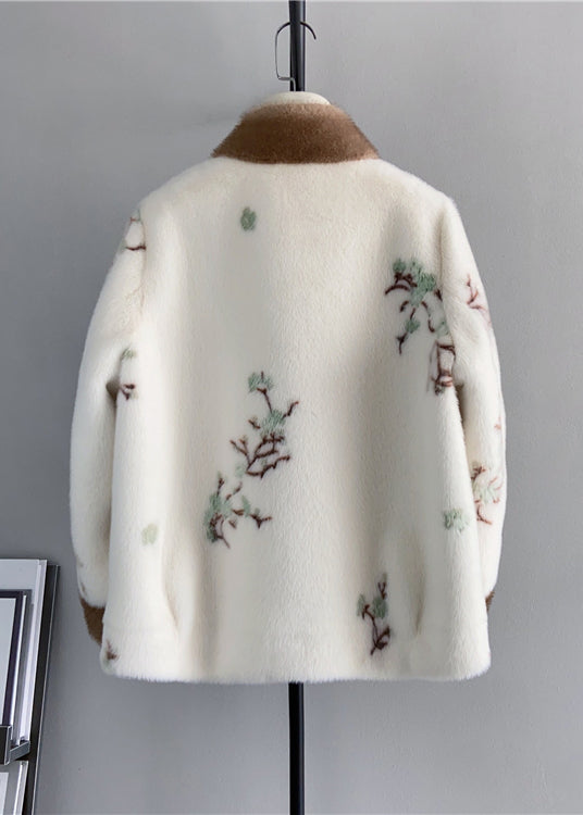 Trendig damjacka i vintage stil med stativkrage. Broderad vinterjacka för kvinnors mode, lös passform.