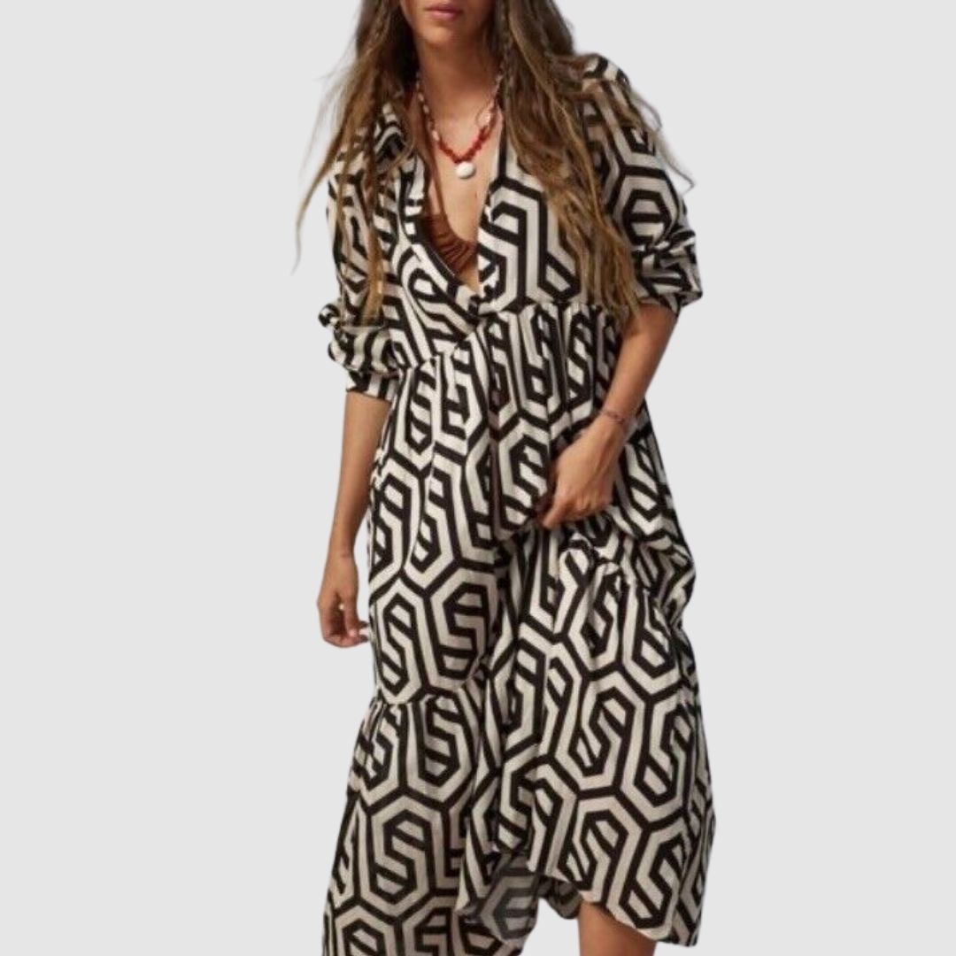 Festklänning med geometriskt mönster, långa ärmar. Modern stil för eleganta kvinnor.