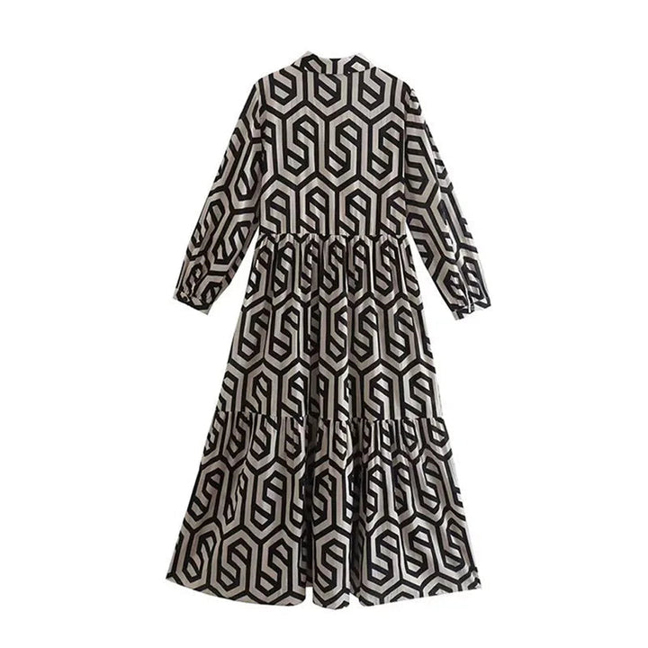 Mångsidig långärmad klänning för kvinnor med elegant geometriskt mönster. Perfekt för modern stil.