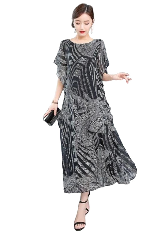 Elegant mönstrad kaftan klänning för kvinnor med sofistikerad O-hals, perfekt som sommarklänning i chiffong.