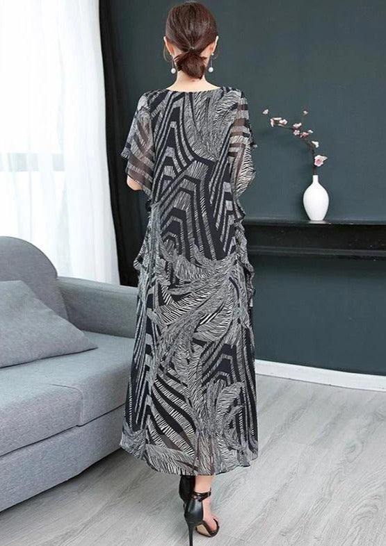 Vacker kvinnors mönstrad kaftan klänning i chiffong med elegant O-hals, idealisk för sommar och fester.