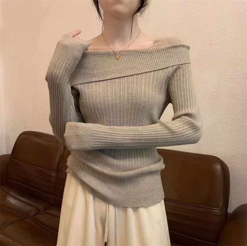 Kvinnors fashion off shoulder-tröja, mångsidig och bekväm för alla eleganta tillfällen.
