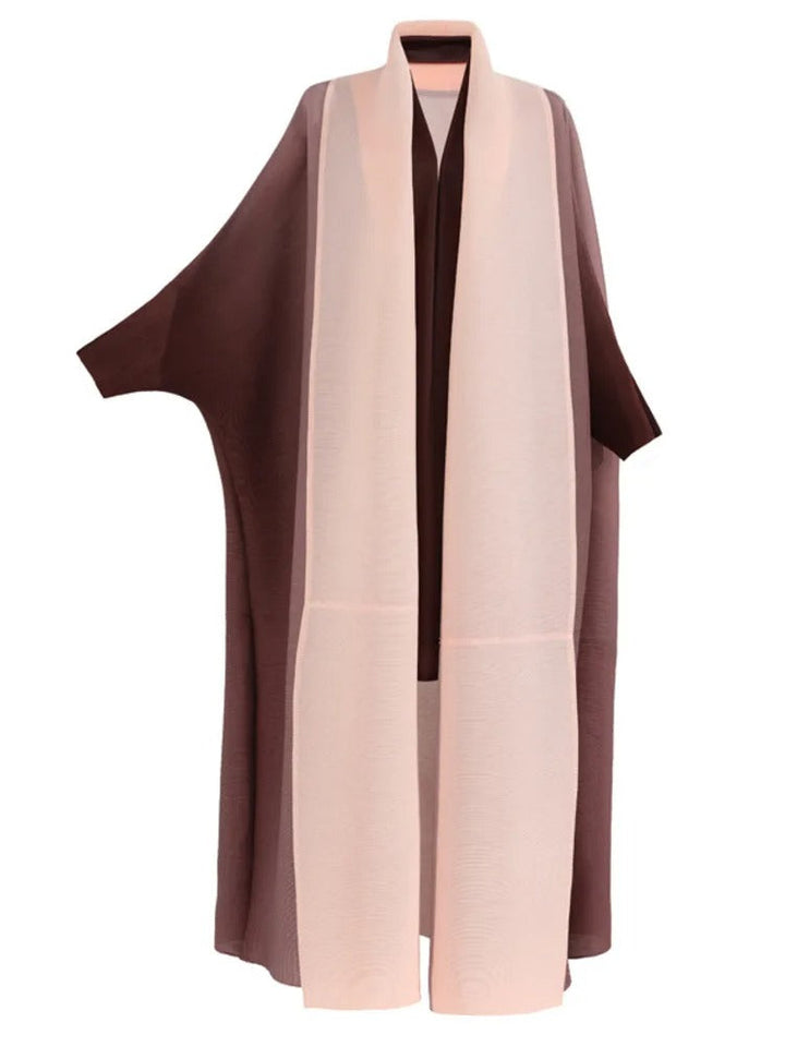 Elegant plisserad gradient trenchcoat för kvinnor. Perfekt vårjacka med modern design.