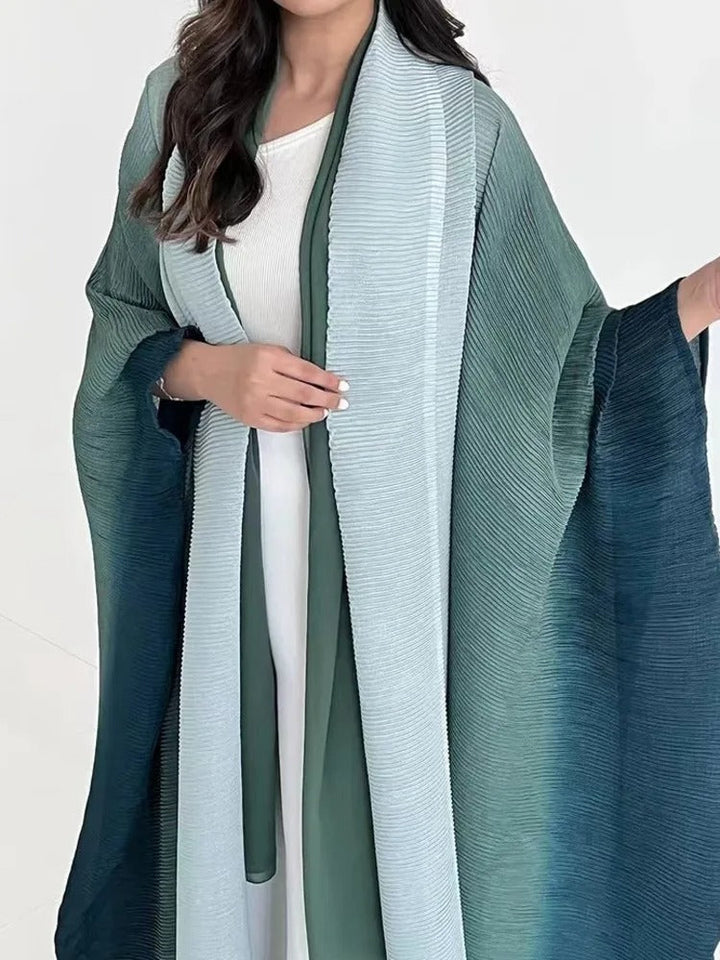 Plisserad gradient trenchcoat i elegant design för kvinnor. Modern och bekväm vårjacka.