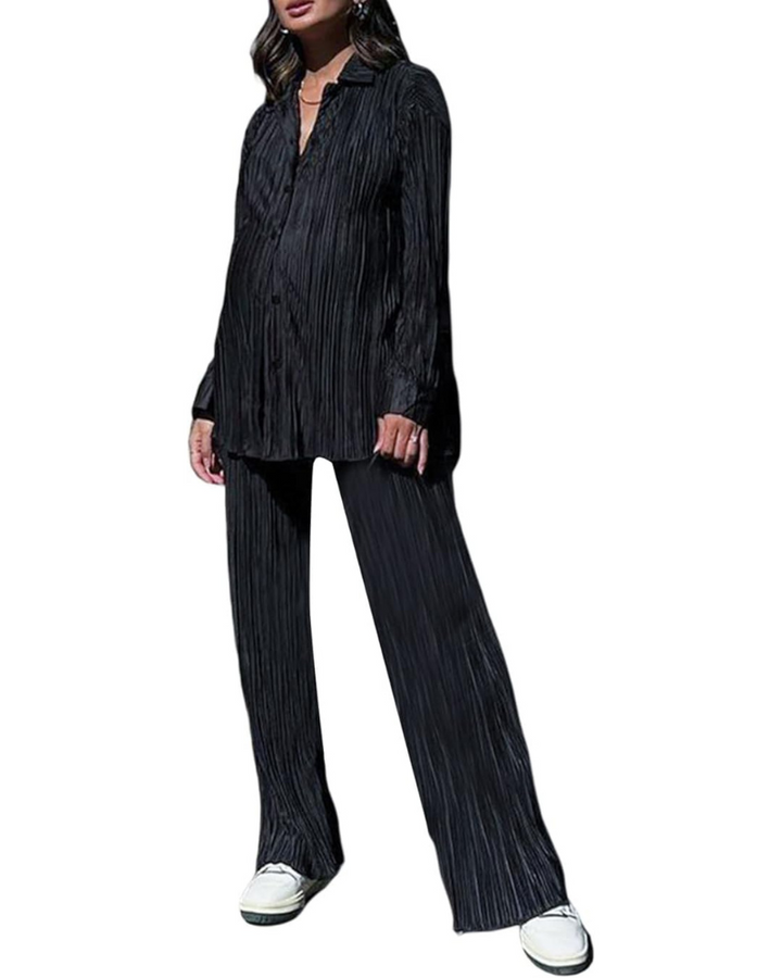 Dam elegant plisserad topp och byxor i matchande set av polyester med hög midja.