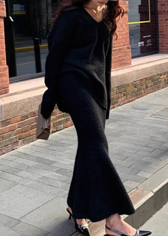 Svart plus size tvådelat set: bekväm tröja och elegant maxikjol. Mångsidiga festkläder för kvinnor.