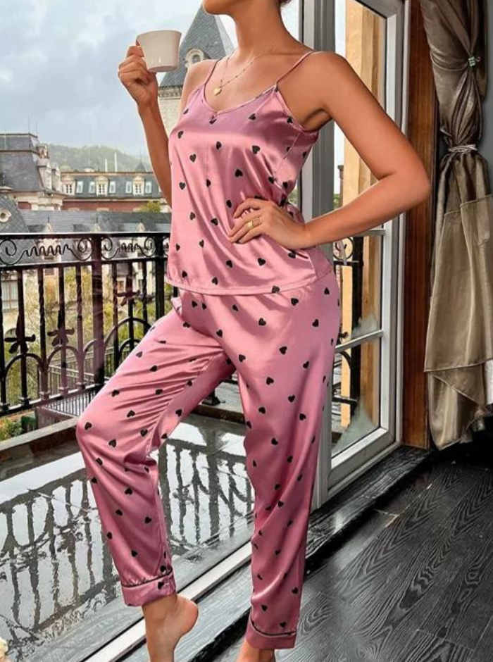 V-ringat pyjamasset i satinlook för kvinnor. Elegant nattlinne med hellånga byxor för stilfulla sovstunder.