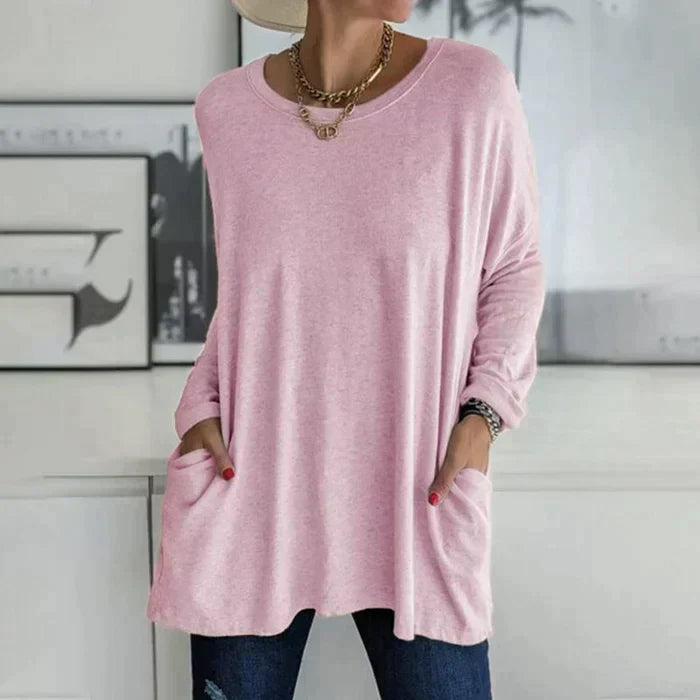 Damers långärmade tunika i svart, en mångsidig och elegant del av höstgarderoben.