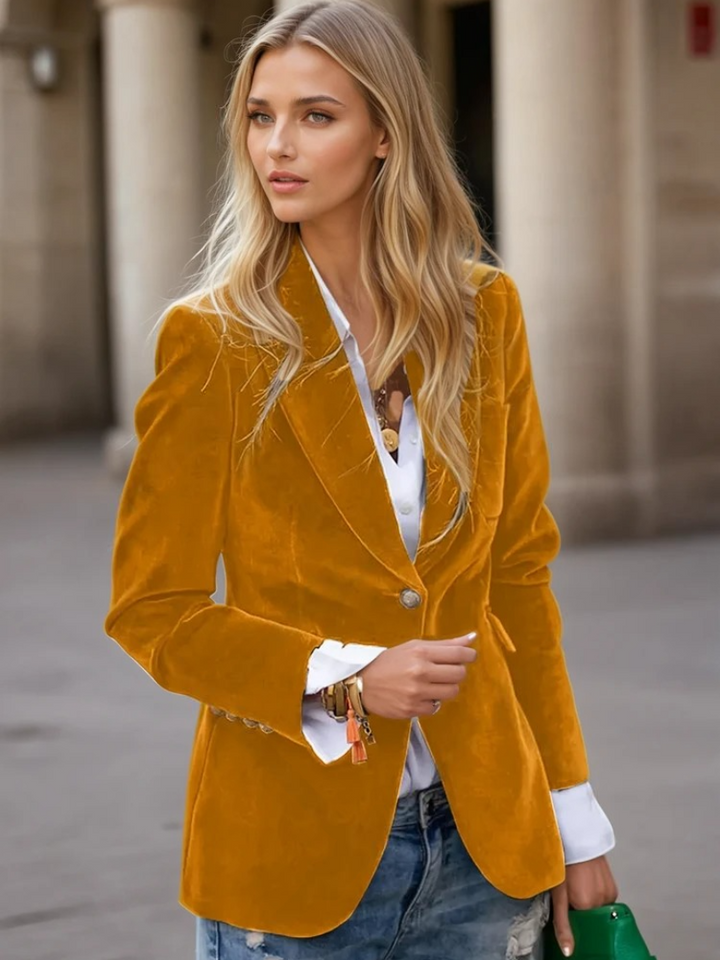 Mångsidig damkavaj med en knapp, tidlös design som lyfter varje outfit. Elegant ytterplagg.